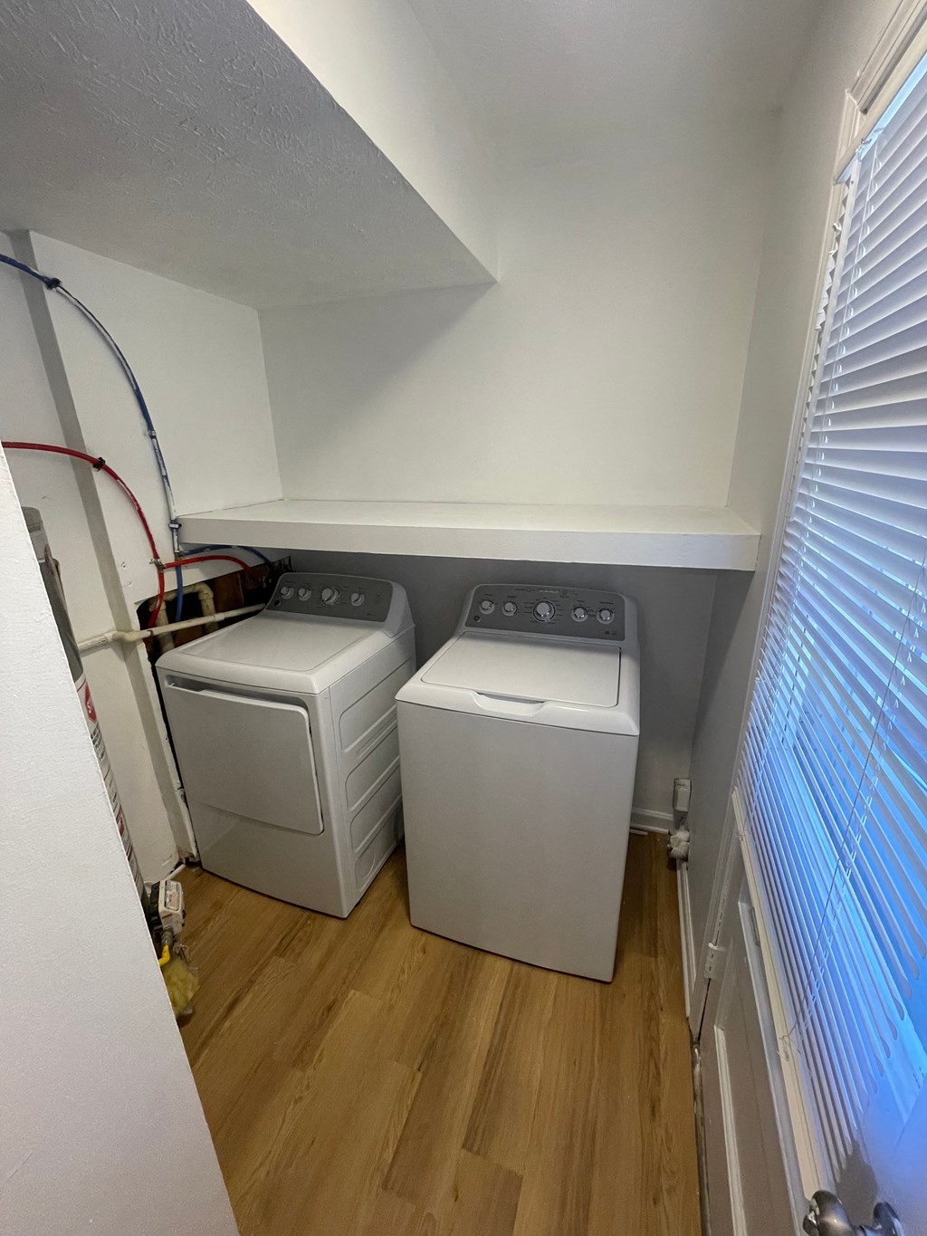 the washer and dryer in the laundry room of a home