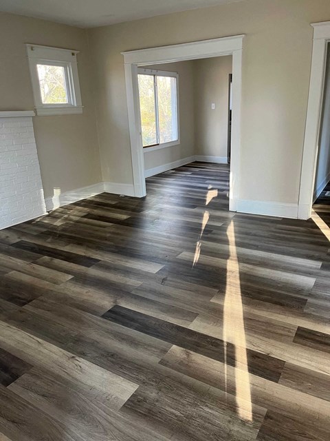 a living room with hardwood flooring in a house