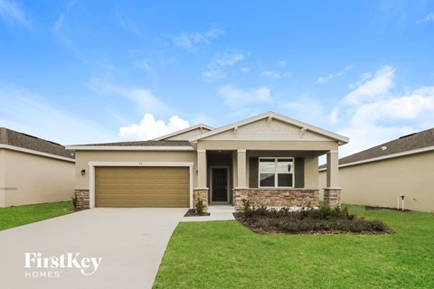 a brand new house with a garage door