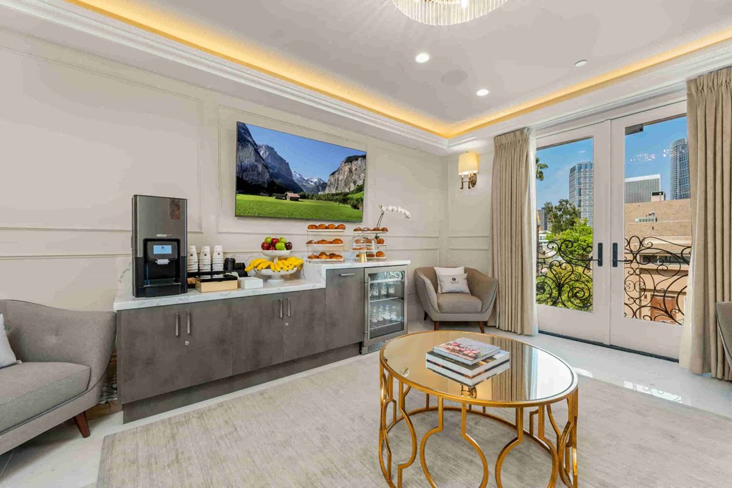 a rendering of a living room with a kitchen and a television