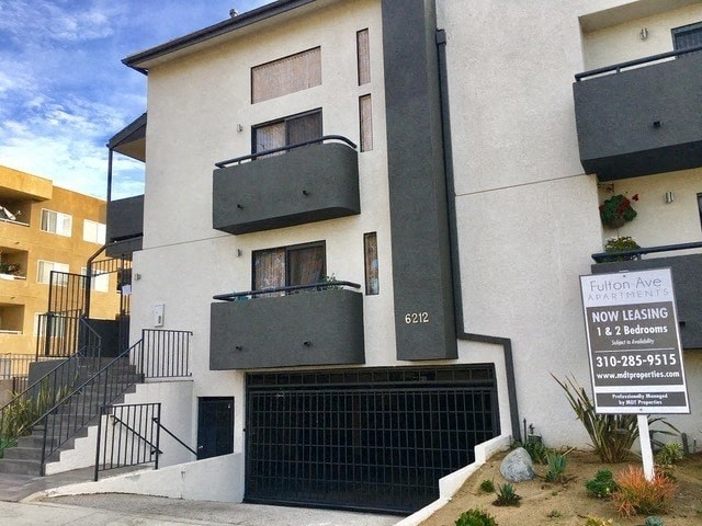 a building with a sign in front of it