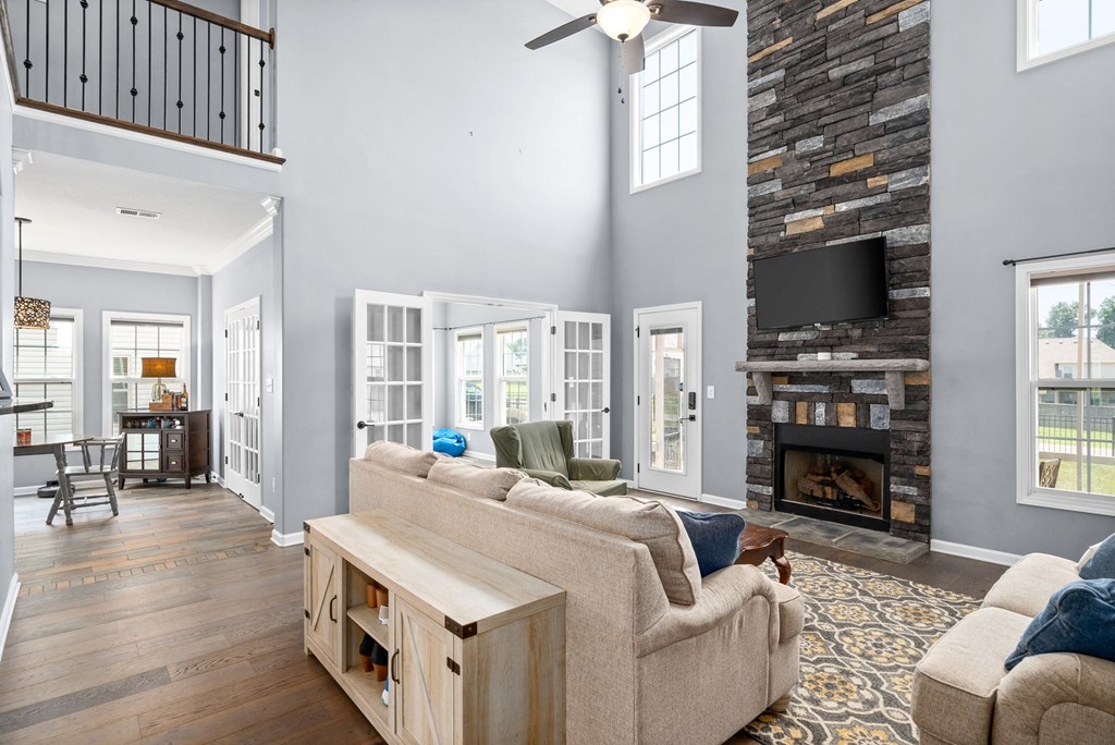 a living room with a couch and a fireplace