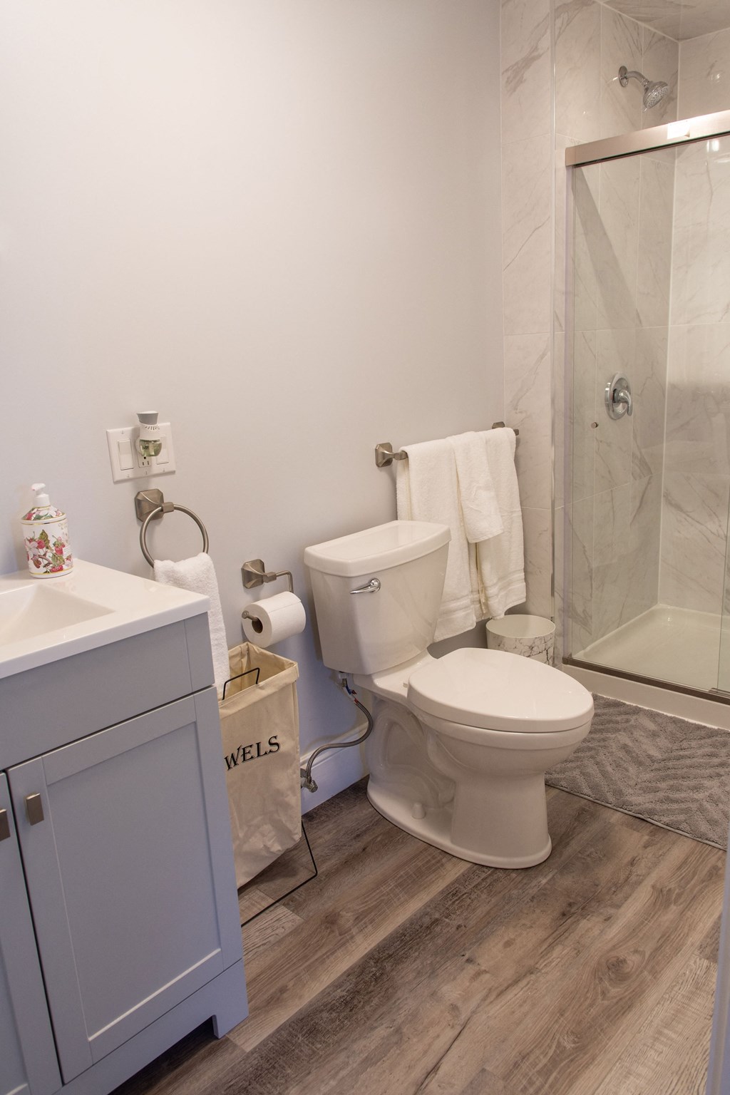 a small bathroom with a toilet and a shower