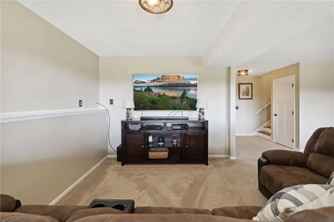 a living room with a couch and a television