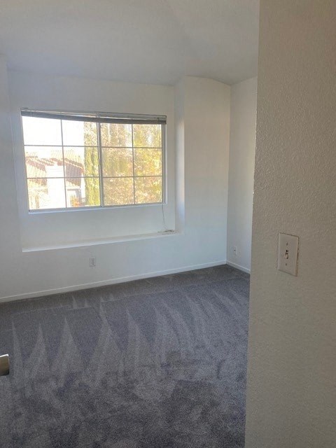 an empty room with a window in it