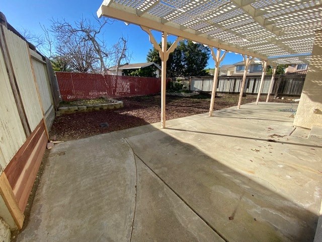 a patio with a white canopy on top of it
