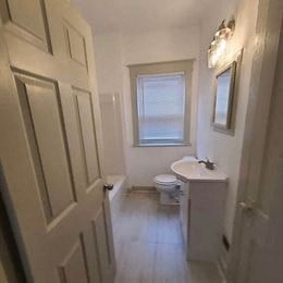 a small bathroom with a toilet and a sink