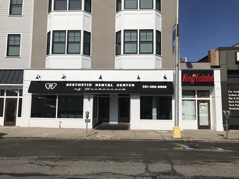 the front of a dental office on a city street