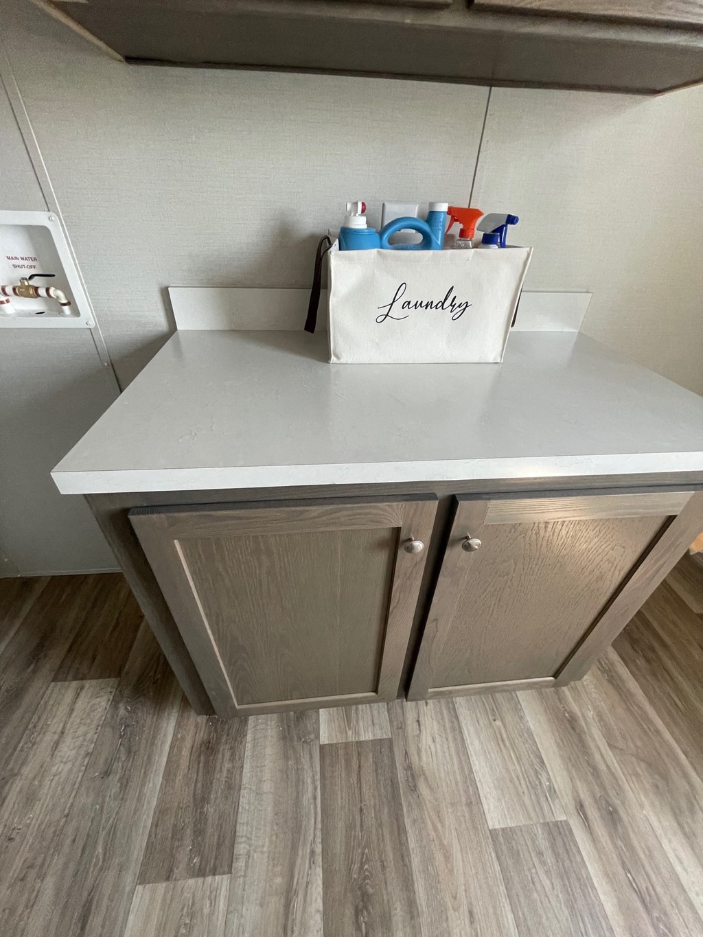 a bathroom with a sink and a bag on top