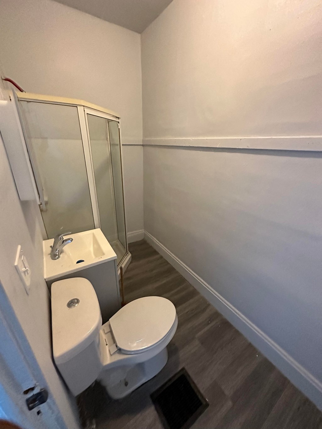 a small bathroom with a toilet and a sink