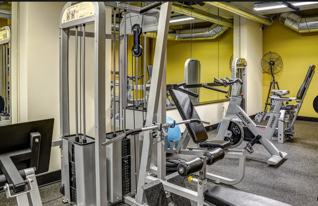 the gym at the flats at big tex apartments