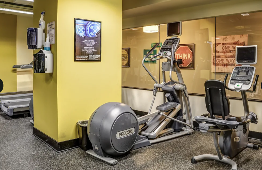 the gym at the innsbruck airport has a lot of exercise equipment