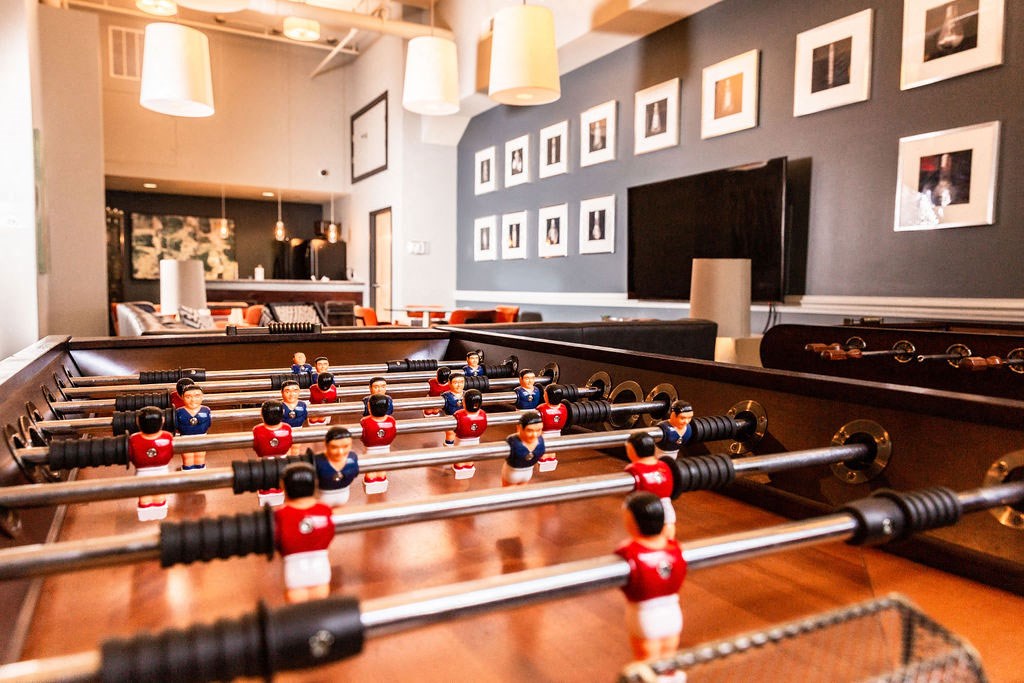 a foosball table in the lobby of a restaurant