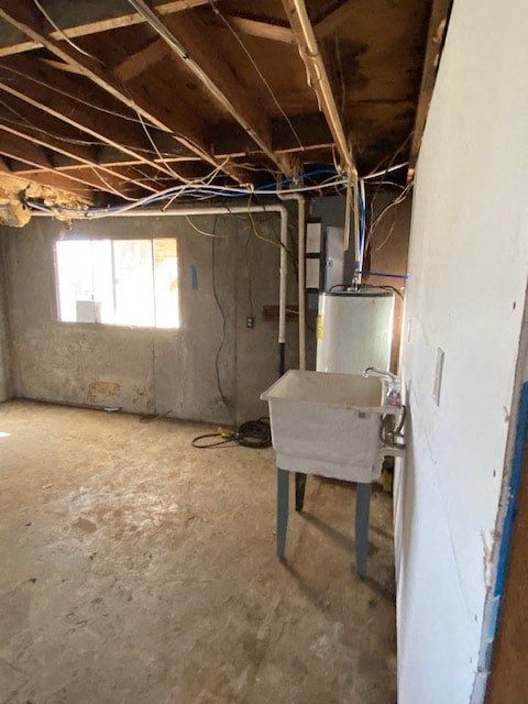 A room with a window and a table with a white container on it.