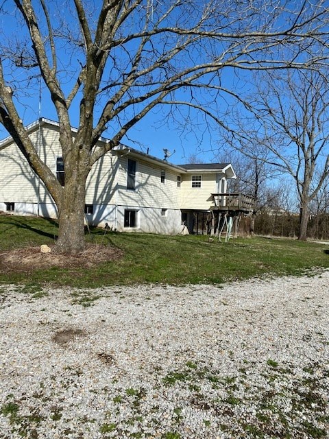 A house with a tree in front of it.
