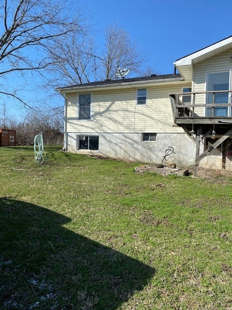 A house with a green lawn and a swing set in the yard.