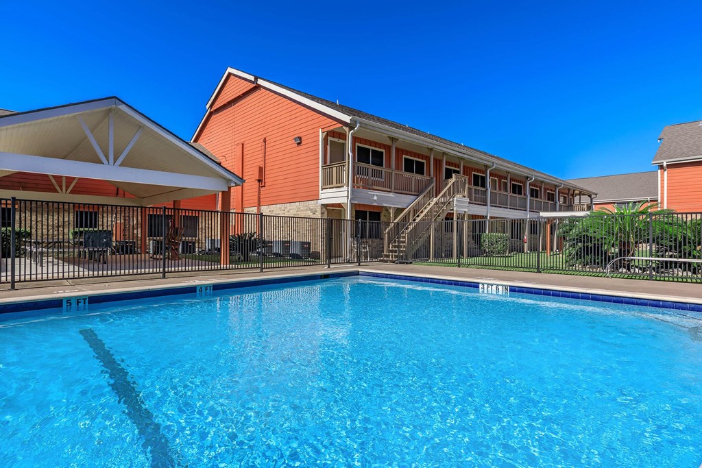 the pool is in front of the building