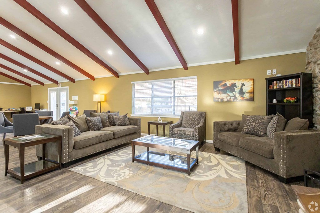 a living room with couches and a coffee table