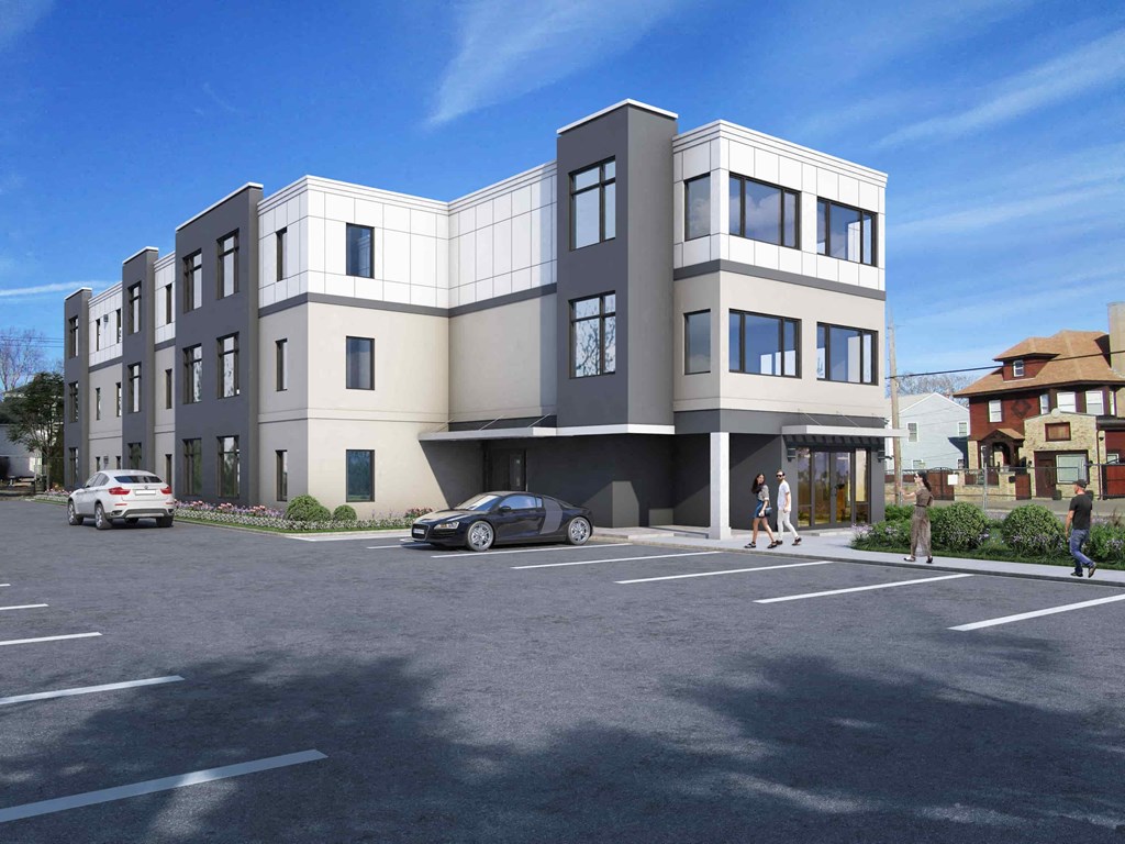 a rendering of a new apartment building on the corner of a parking lot