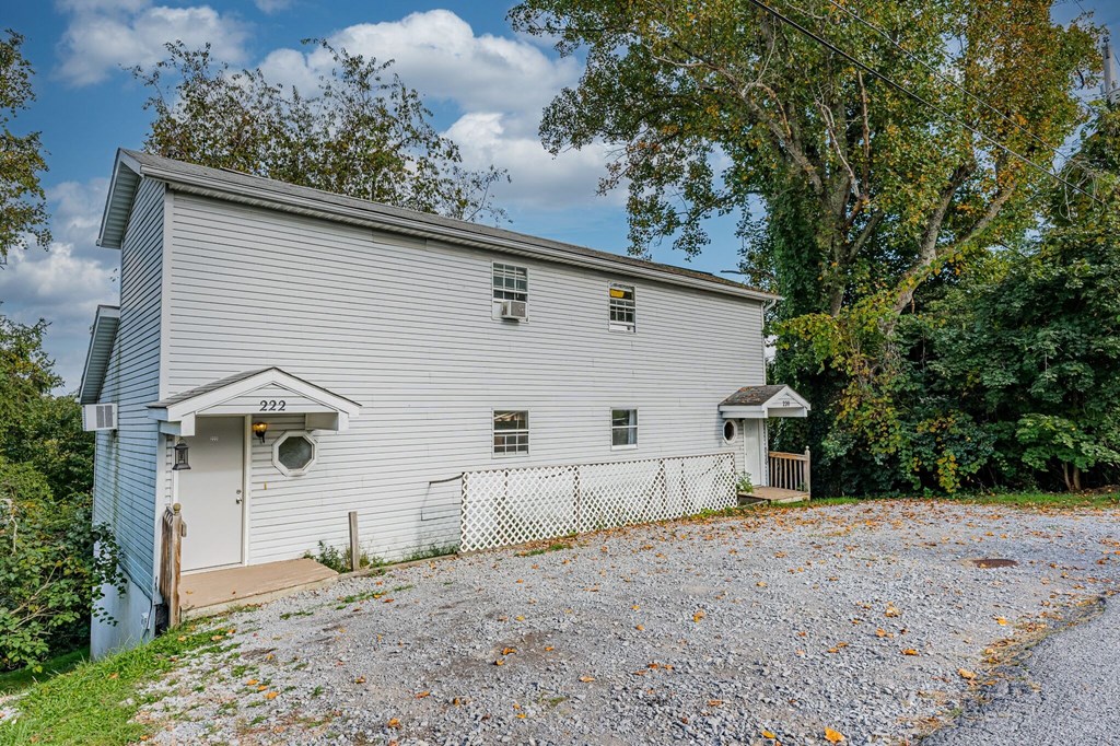 A white building with the number 222 on it.