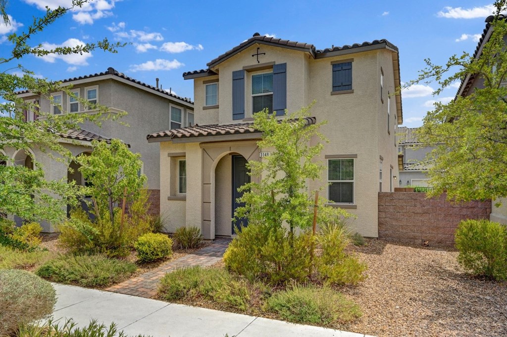 a house with a pathway in front of it