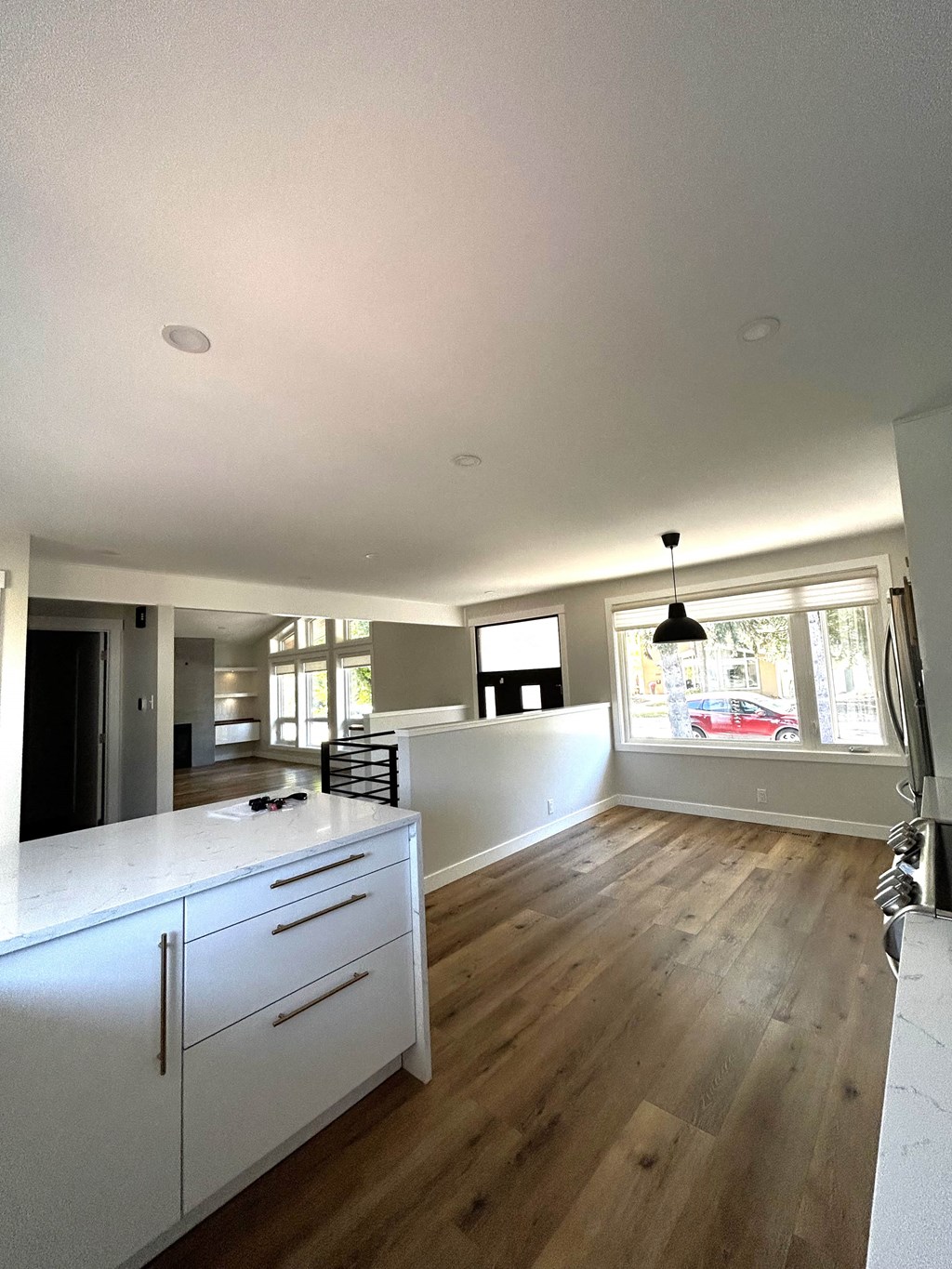 a view of the kitchen and dining area from the living room