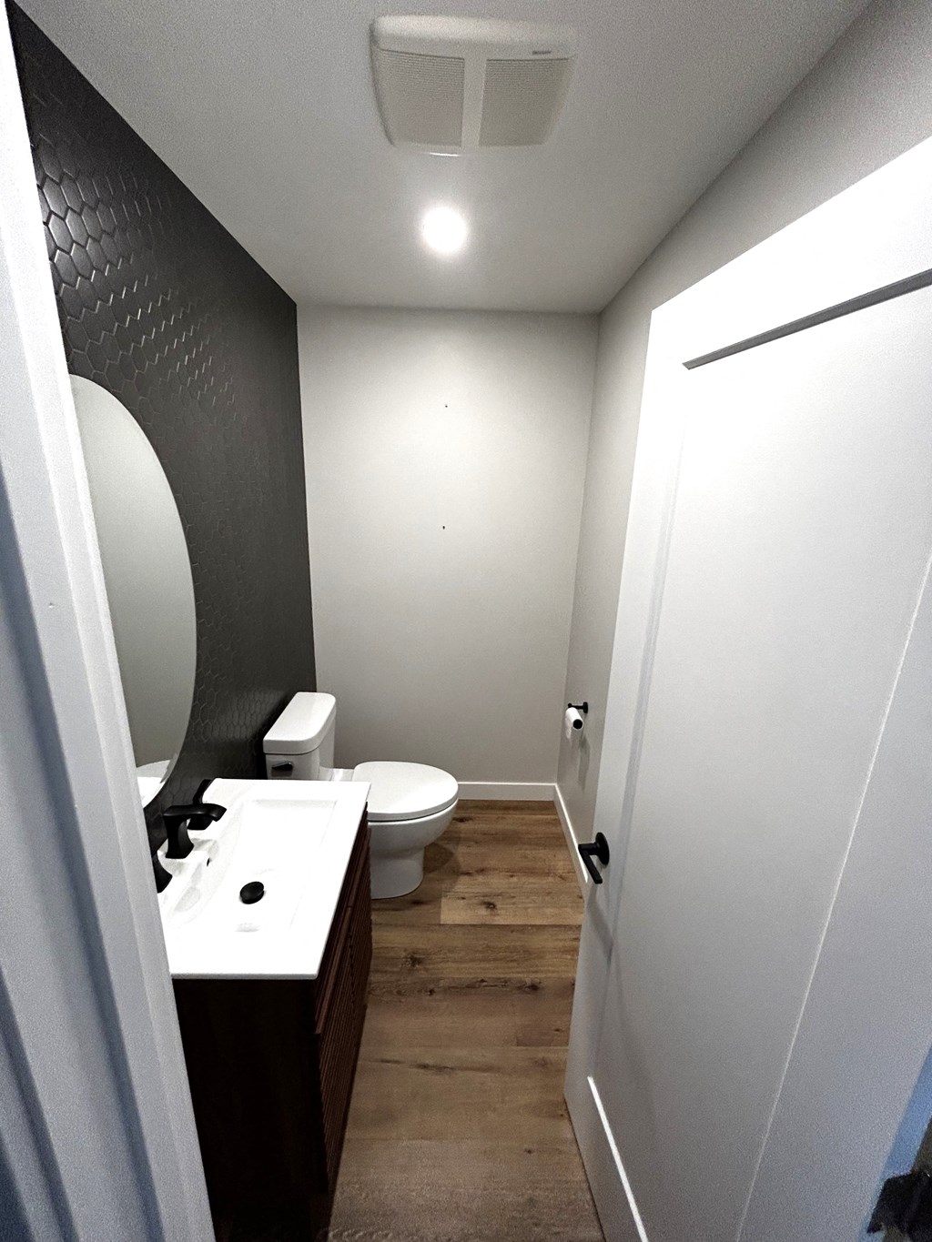 a small bathroom with a toilet and a sink