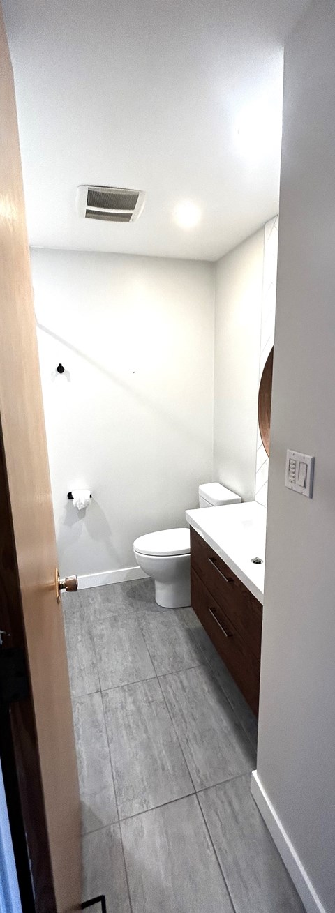 a small bathroom with a toilet and a sink