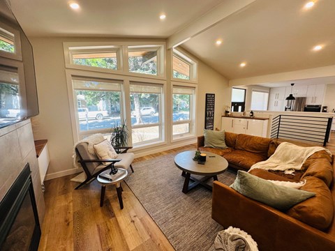 a living room with a couch and a table