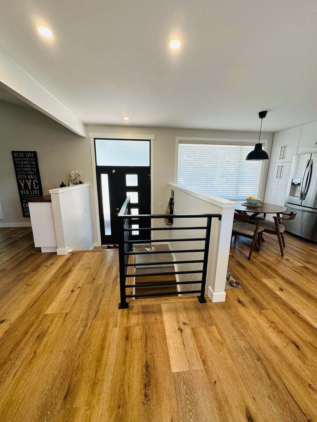 a view of a living room from the stairs