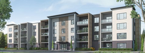 A row of modern apartment buildings with balconies and trees in front.