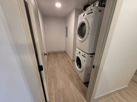 A laundry room with a washer and dryer.