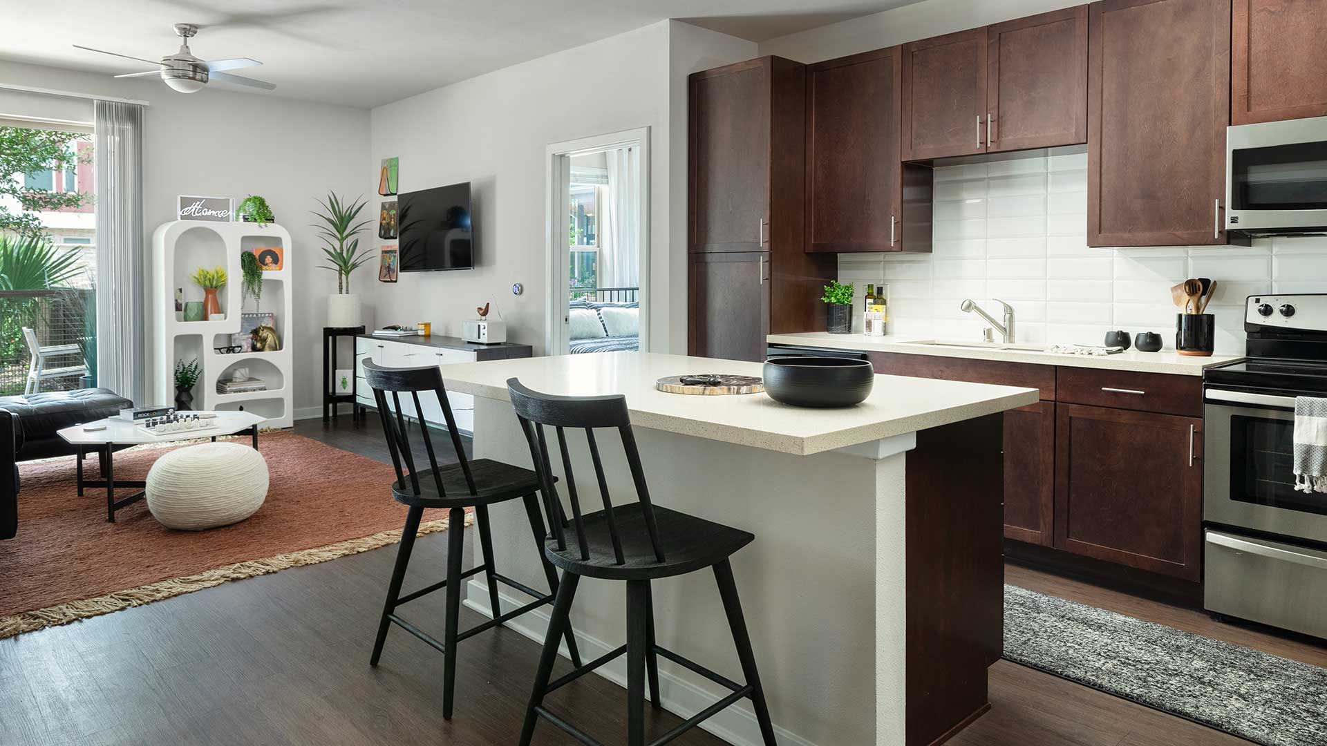 A kitchen and dining area in a modern apartment.