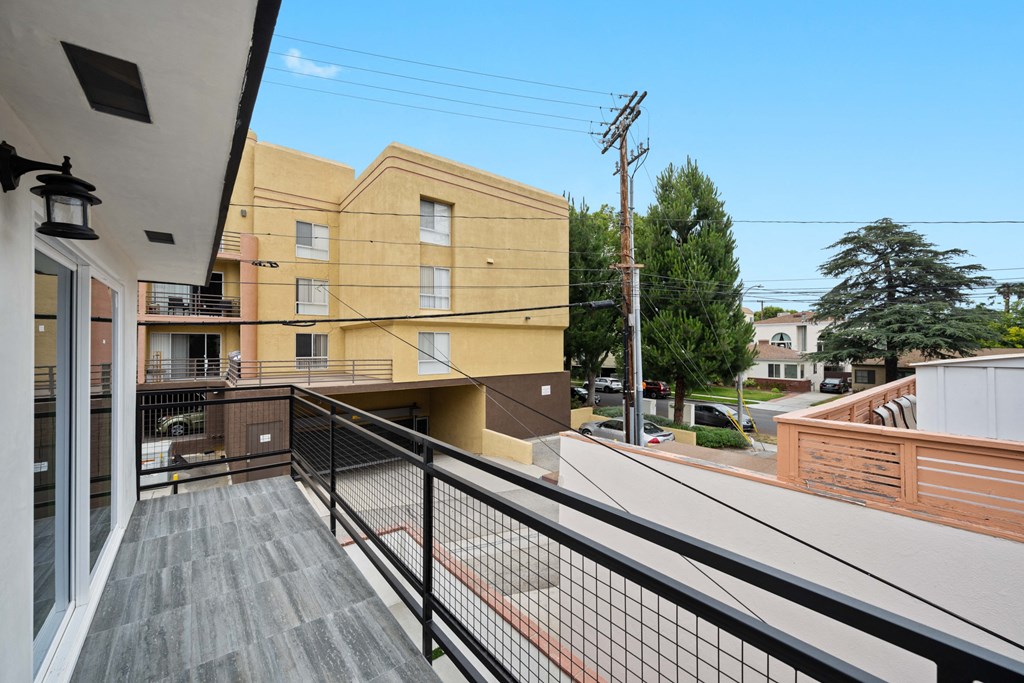the view from the balcony of an apartment building