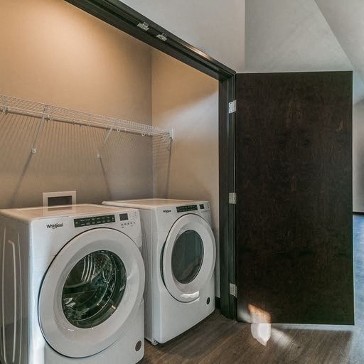 a washing machine and a dryer in a laundry room