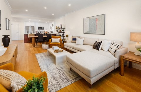 a living room with a couch and a table
