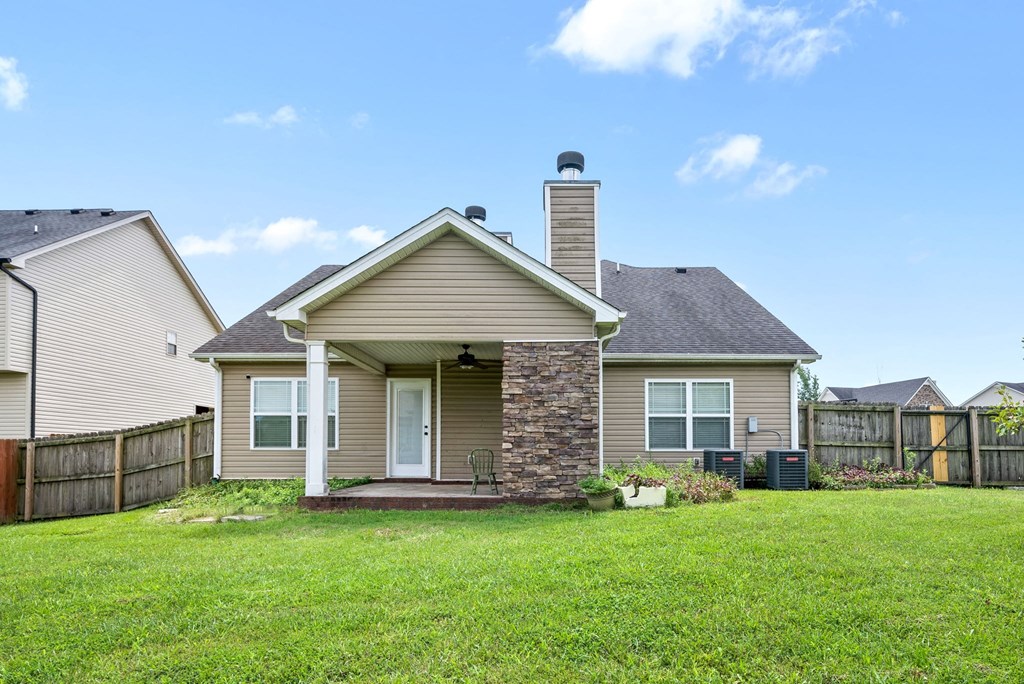 a house with a yard in front of it