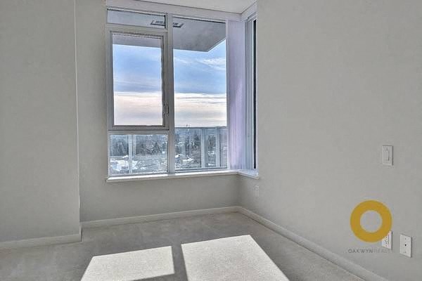 a empty room with a large window and