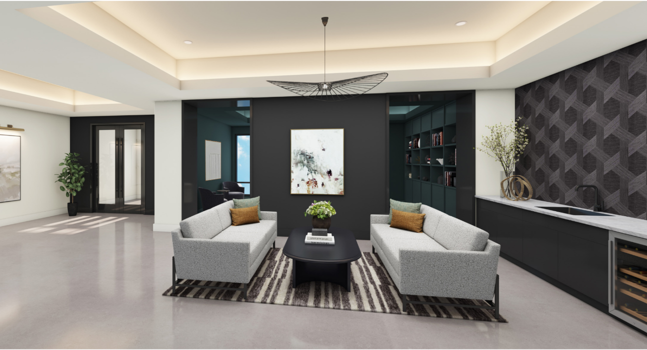 A modern living room with a grey sofa and a black coffee table.