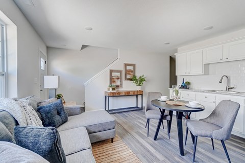 a living room with a couch and a table
