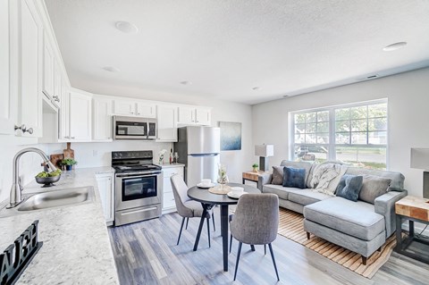 a living room with a couch and a table