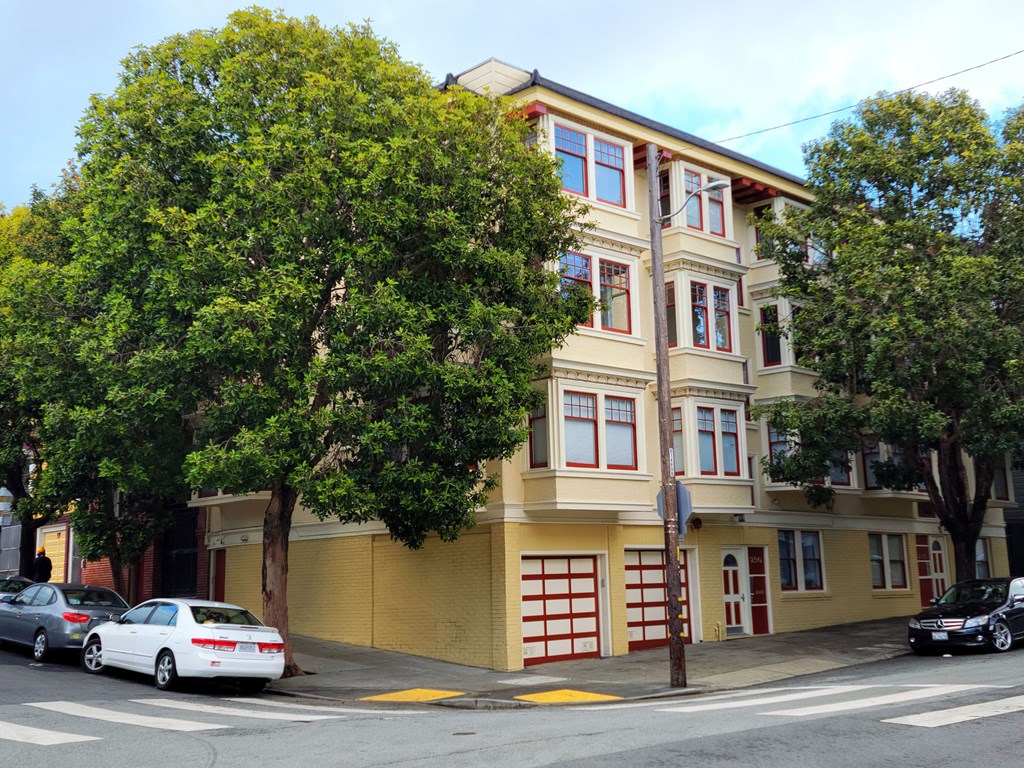 a building on the corner of a city street