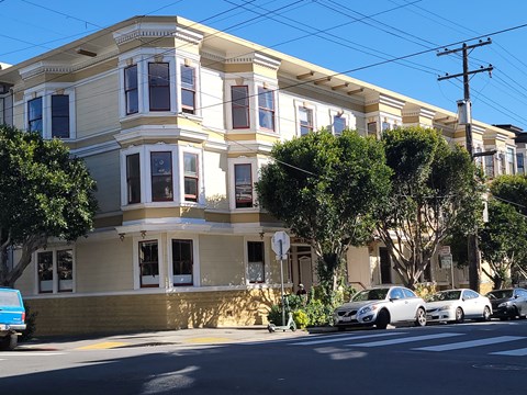 a building on the corner of a city street