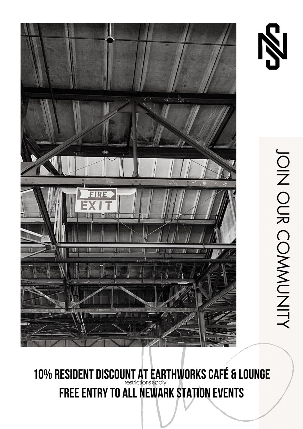 a black and white photo of the ceiling of a train station