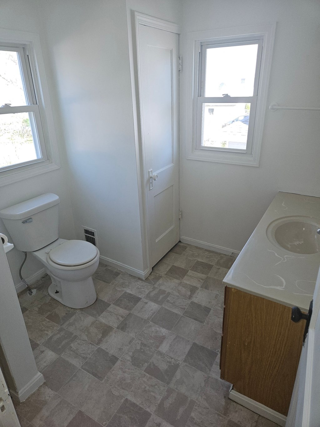 a small bathroom with a toilet and a sink