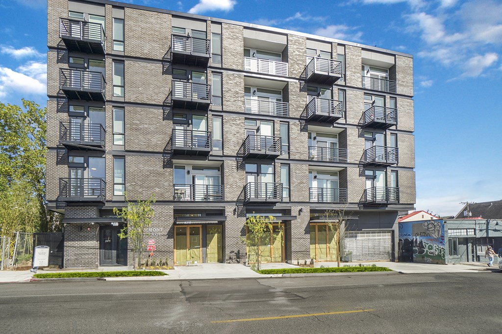 a brick apartment building on a city street