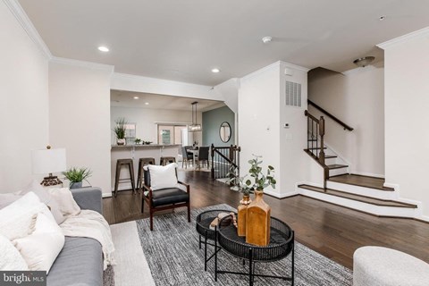 a living room with a couch and a table