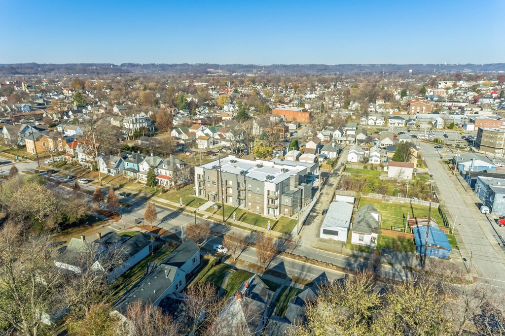 an aerial view of a neighborhood with houses and trees