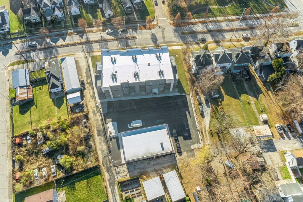 an aerial view of a roof of a building with skaters on it
