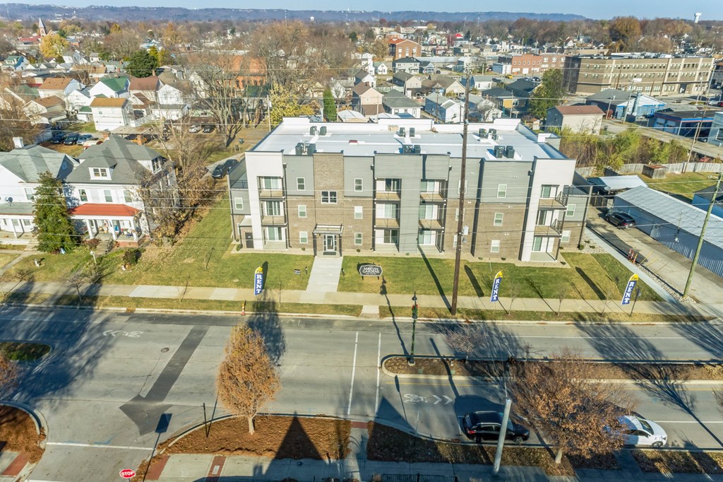 an aerial view of an apartment building in a city